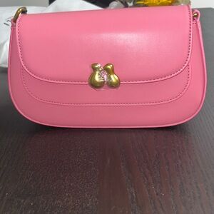 Elegant Pink Crossbody Bag with Gold Detail